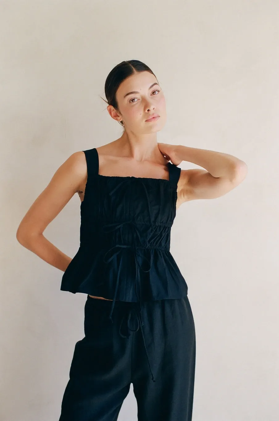Woven Tiered Tie Front Ruffle Hem Top - Black
